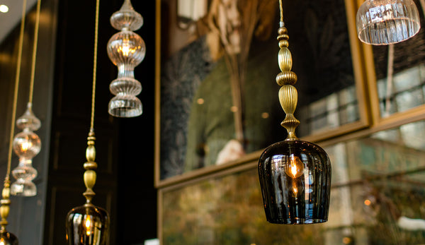 Standing and Spindle Pendants by Rothschild & Bickers hanging over bar are in Motel One Glasgow