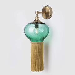 Diamond Chochin Wall Light, luxury glass wall light with hand-blown green shade and fabric fringe.