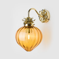Polished Brass Floral wall light with fluted amber glass shade