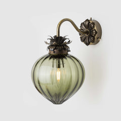 Antique Brass Floral wall light with fluted eel green glass shade