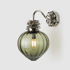 Glass wall sconce in khaki eel green with polished Nickel metal arm