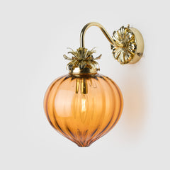 Polished Brass Floral wall light with fluted peach glass shade