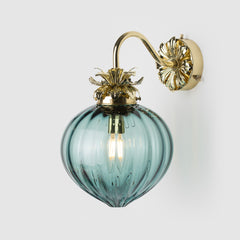 Polished Brass Floral wall sconce with fluted teal color glass shade