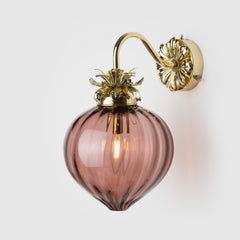 Fluted glass wall sconce in mocha tea color and polished brass arm