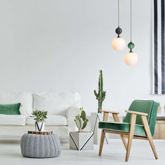 Striped colour glass and white pendant lights in living room