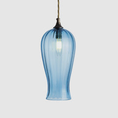 Aqua blue glass pendant light on a white background
