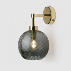 smoke grey glass wall light in polished brass