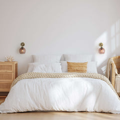 Credit: Petite Ball Wall Light in Tea Diamond, Antique Brass Metalwork