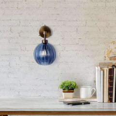 Credit: Petite Ball Wall Light in Denim Optic, Antique Brass Metalwork