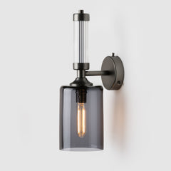 Fluted or reeded glass tube_grey mouth-blown glass shade_Matte Bronze sconce_Pillar Wall Light