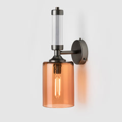 Fluted or reeded glass tube_Peach mouth-blown glass shade_Matte Bronze sconce_Pillar Wall Light