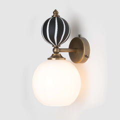 decorative black and white glass wall sconce