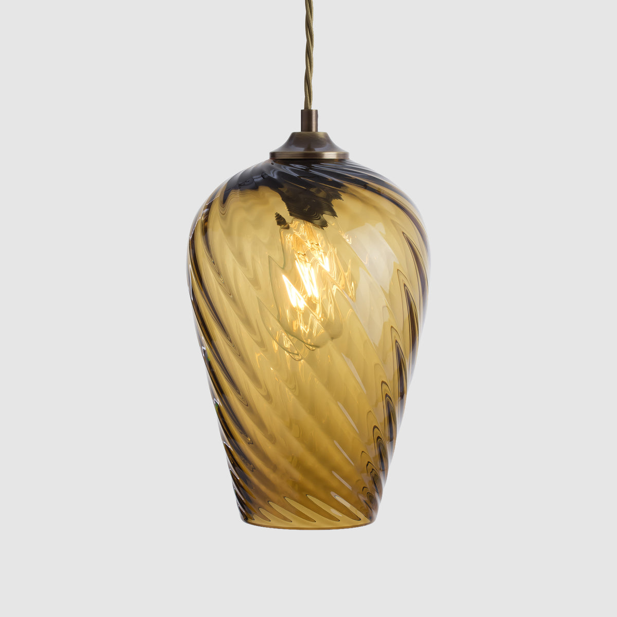 Yellow glass pendant light with a optical textured with brss fittings