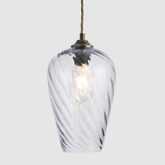 Clear twisted rib glass light shade with antique brass cordset