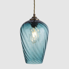 Mouth blown teal blue twisted glass suspension light with filament LED bulb