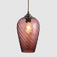 Dusty pink twisted glass pendant light for kitchen island