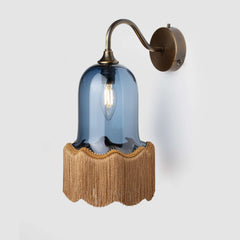 Fringe wall sconce