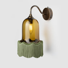 Green trimmed glass wall sconce