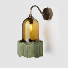 Green trimmed glass wall sconce