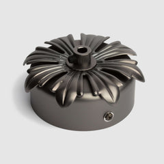 Decorative pressed metal ceiling canopy with floral detail for pendant lighting