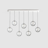 Long rectangular ceiling plate for multiple pendant lights over a table