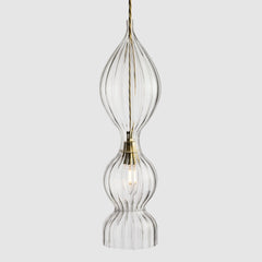 Spindle shaped clear ribbed glass pendant light with fabric covered twisted flex