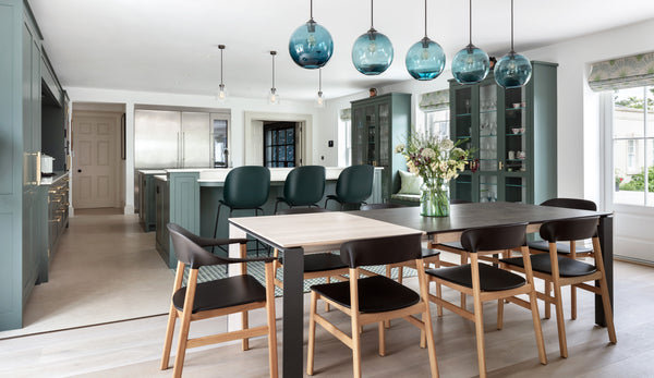 Pick-n-Mix Large Ball Pendant by Rothschild & Bickers over a kitchen dining table