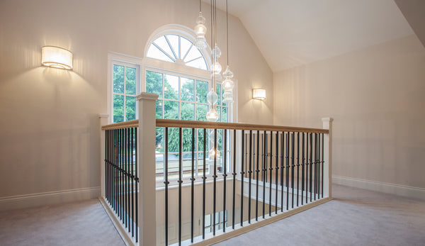 Rothschild & Bickers Spindle Pendants cascading through stairwell with feature georgian window, Interior by Katie Elizabeth Design