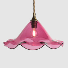 Frilled glass shade in Ruby_cranberry glass_antique brass_fabric covered flex