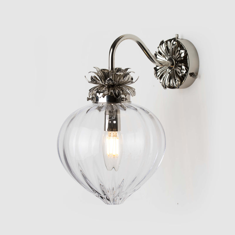 Polished Nickel Floral wall light with clear fluted glass shade