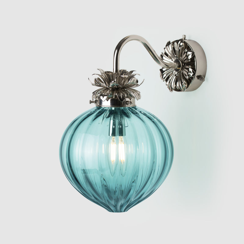 Polished Nickel  Floral wall sconce with fluted copper blue glass shade