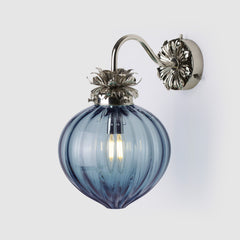 Polished Nickel  Floral wall light with fluted denim blue glass shade