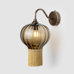 Bronze coloured wall light with gold fringe 