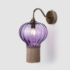 Purple wall light with elegant ribbed glass design