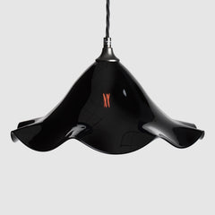 Black frilled glass pendant light shade with twisted fabric covered flex