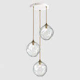 Group of clear organic glass decorative pendant lights hanging on ceiling plate
