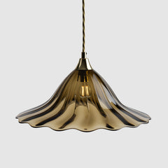 Olive green ribbed glass decorative pendant light with brass fittings and twisted fabric covered flex