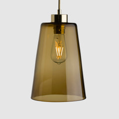 Sargasso pot shaped pendant light in clear glass with brass fittings and fabric covered flex