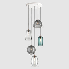 Blue, grey and clear blown glass pendant lights on a ceiling plate with silver colour fittings