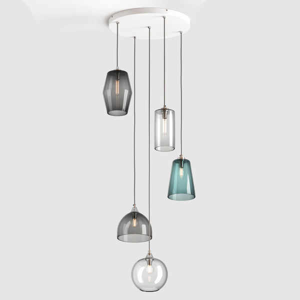 Blue, grey and clear blown glass pendant lights on a ceiling plate with silver colour fittings