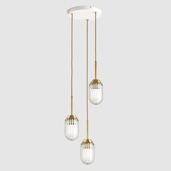 Group of clear ribbed glass nautical style decorative pendant lights hanging on a ceiling plate