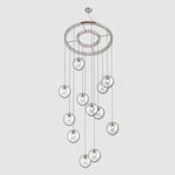 Circular suspension ring for hanging multiple pendant lights over stairwell or in foyer entrance
